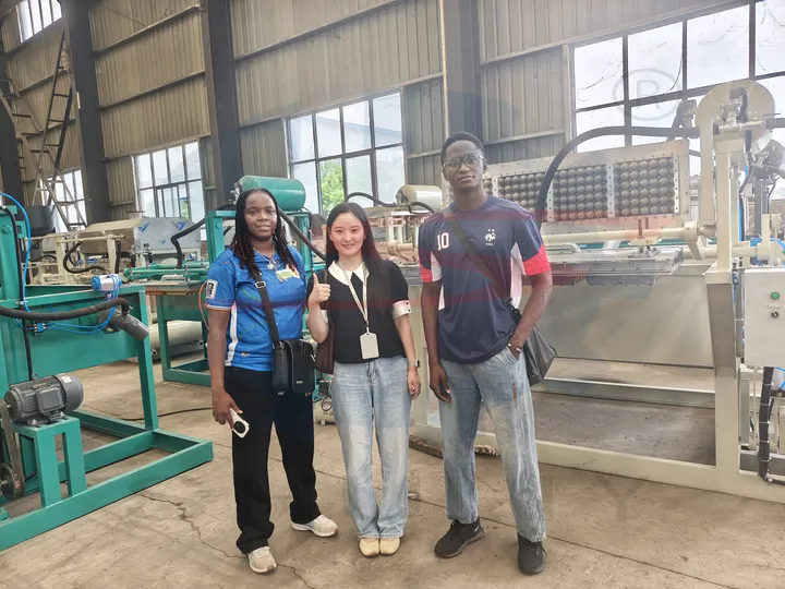 A client from central africa visits the shuliy egg tray machine factory